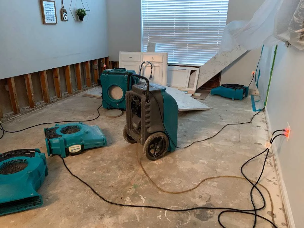 Dehumidifier in flood-cut room for Water Damage Restoration in Glencoe